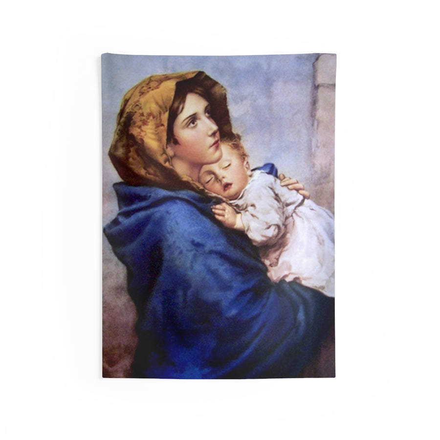 Madonna and Child tapestry hanging in a prayer corner beside an armchair