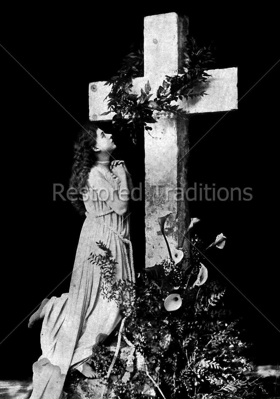 Girl Prays Beneath Cross